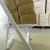 Side View of Maria Cutlery on a NES Reliable White Resin Folding Chair